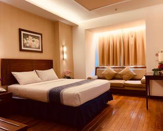 Grand Orchid Hotel - Kota Solo - Kamar Tidur