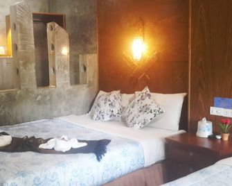 Ruan Mai Naiyang Beach Resort - Sakhu - חדר שינה