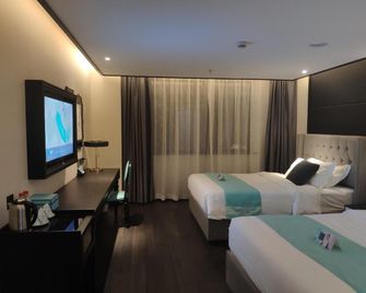 Xana Hotelle Nanjing Xinjiekou Daxinggong Metro Station - Nanjing - Schlafzimmer