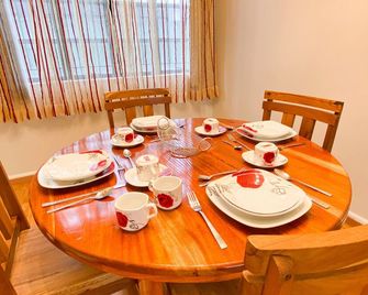 Stylish Fully Furnished 2 Bedroom Apartment on Queens Park Savannah - Port of Spain - Dining room