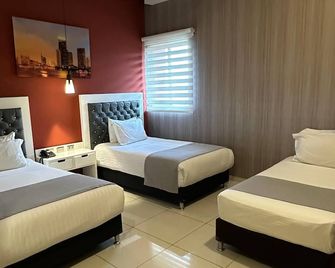 Mirago Hotel - Yumbo - Quarto