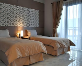 Grand Ussu Hotel And Convention - Bogor - Slaapkamer