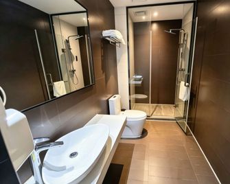 Iu Hotel Tianjin Xiqing Meijiang Convention Center Dasi Branch - טיאנג'ין - חדר שינה