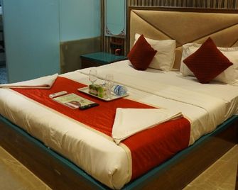 Hotel Versova Inn - Μουμπάι - Κρεβατοκάμαρα