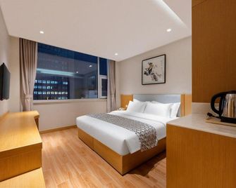 Huayang Hotel - Tangshan - Habitación