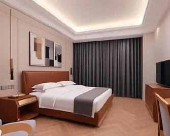 Changzhou Soluxe International Grand Hotel (Qingguo Lane Wuyue Plaza) - Thường Châu - Phòng ngủ