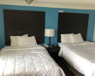 Gratiot View Motel - Saginaw - Спальня