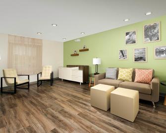 Woodspring Suites Las Colinas - Northwest Dallas - Irving - Living room