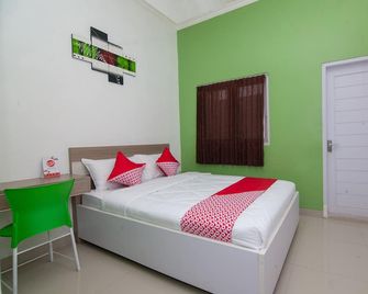 Hotel O D'residence Syariah - Tegal - Habitación