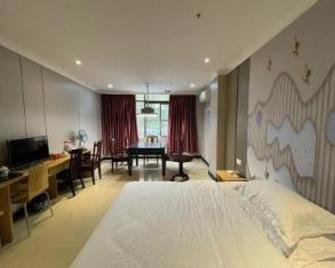 Golden Leaf Hotel Jiangmen - Jiangmen - Slaapkamer