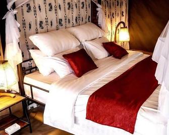 Osinon Camps & Lodges - Serengeti - Bedroom