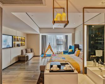 Echarm Plus Hotel Xiangyang Minfa Century New Town - Xiangyang - Bedroom