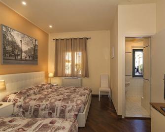 Hotel Il Giardino - Pisa - Camera da letto