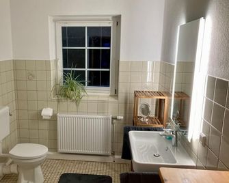 Thomsen - familienfreundliche Ferienwohnung mit großem Garten - Tarp