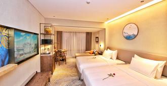 Dong Fang Hotel - Guangzhou - Bedroom