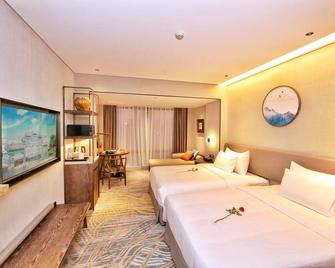 Dong Fang Hotel Guangzhou - Guangzhou - Bedroom