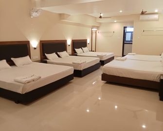 Hotel Sridevi - Kanyakumari - Спальня