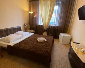 Mini hotel Mayak - Tyumen - Bedroom