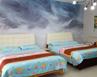 Huaxin Apartment Hotel - Trường Sa - Phòng ngủ