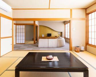 Johnnobi Onsen Takayanagi Johnnobi Village - Tokamachi - Schlafzimmer