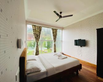 Tulips Valley View Resorts - Ooty - Phòng ngủ