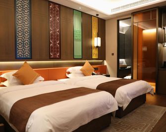 Qinhuai Renjia Boutique Hotel (Yancheng High-Speed Railway Station Branch) - Yancheng - Camera da letto