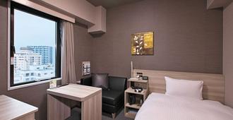 Hotel Route-Inn Toyama Ekimae - Toyama - Bedroom
