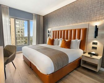 @Sandton Hotel - Johannesburg - Schlafzimmer