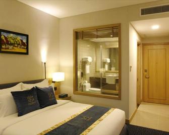 Ciao Saigon Hotel & Spa - הו צ'י מין סיטי - חדר שינה