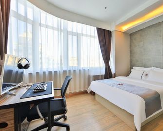 Charles Hotel (Yanji Korean Folk Park Dinosaur Kingdom Branch) - Yanbian - Quarto