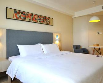 Hanting Hotel Changchun Convention And Exhibition Center Linhe Street - Чанчунь - Спальня