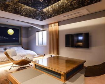 Fugetsugyosho Ryokan - Toyooka - Living room