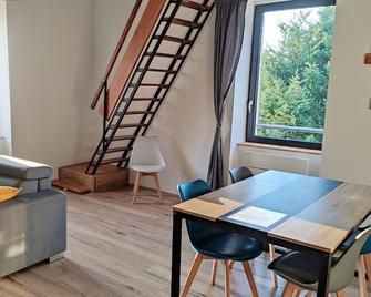 Appartement duplex dans une ancienne usine - Beaupréau - Salle à manger