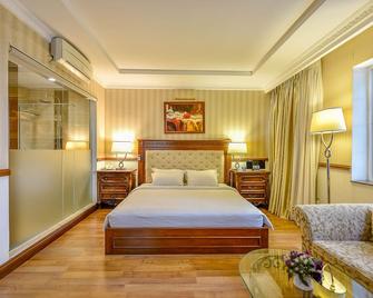 بوتيك جاردن هوتل - هوتشي مين سيتي - غرفة نوم