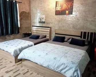 อิงนา รีสอร์ท - พิจิตร - ห้องนอน