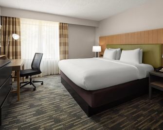 Wingate by Wyndham Lincoln Airport East I-80 - לינקולן - חדר שינה