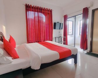 Karthika Residency - מונאר - חדר שינה