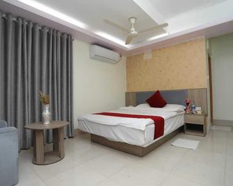 Wood Burn Hotel - Bogra - Bedroom