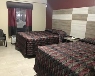 La Bella Inn - Tavares - Slaapkamer