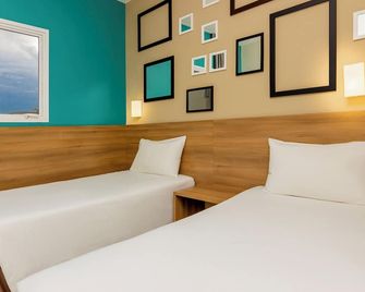 Golden Tower Express Braz Olaia by Fenix Hoteis - Ribeirão Preto - Slaapkamer