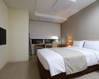 أوربان بالاس جانج نام - سيول - غرفة نوم