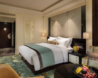 The Pury Hotel Yiwu - Jinhua - Slaapkamer