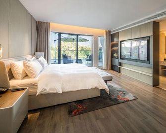 Tanghu Hotel Chengdu - Chengdu - Schlafzimmer