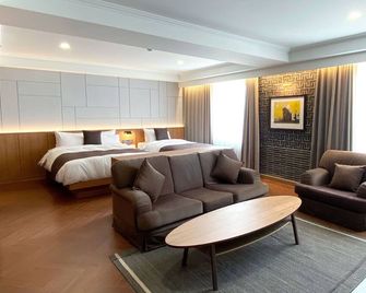 Commodore Hotel Gyeongju - גיאונגז'ו - חדר שינה