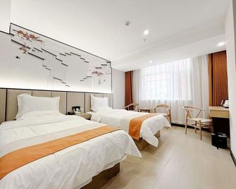 Shanxi Yuetu Hotel (Jinyang Lake Convention and Exhibition Center Wanxiang City Branch) - Taiyuan - Slaapkamer