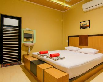 Yani Homestay - Padang - Sypialnia