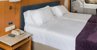 Hotel Ciudad de Valladolid - Valladolid - Schlafzimmer