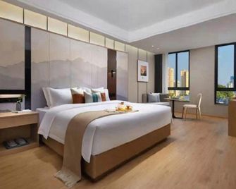 Yiwu Ling Shang Hotel - Ťin-chua - Ložnice