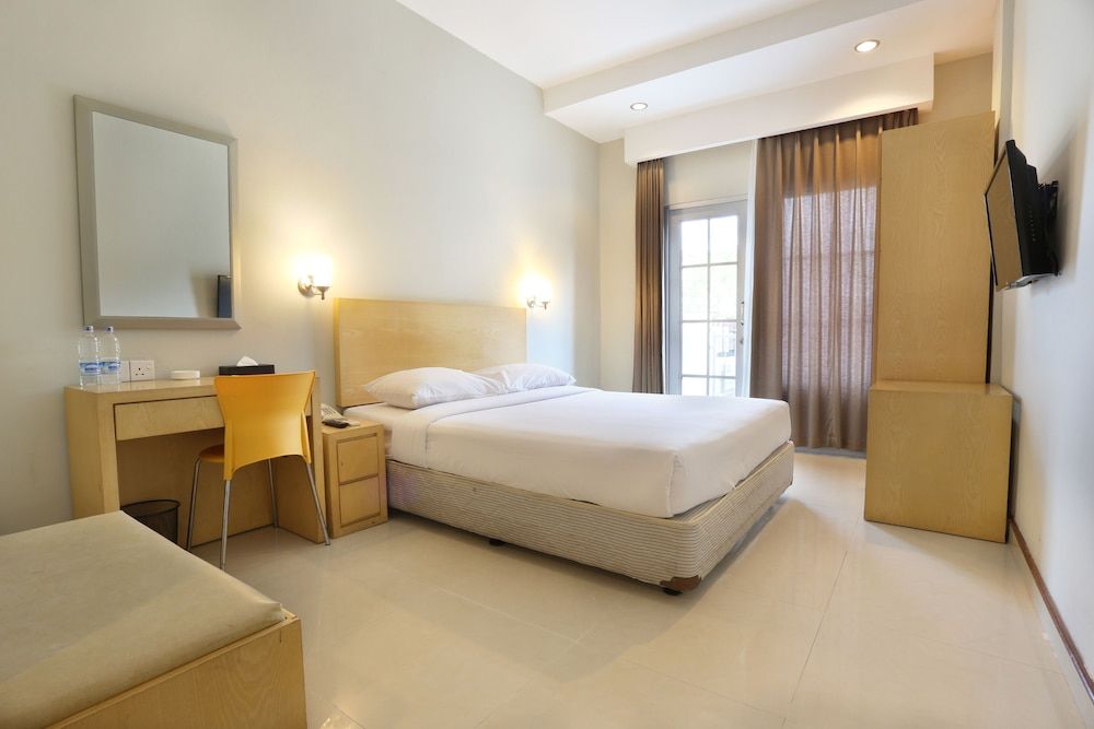 Triniti Hotel Batam - באטאם קוטה - חדר שינה