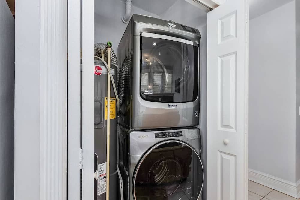 Laundry facility view of Casa Historia: Sleek 2b Apt Unique Spot Downtown